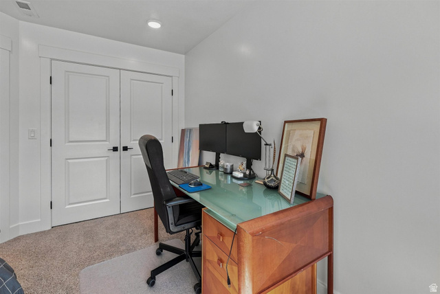 355 West 3085 South Logan, UT 84321 - Photo 32 of 40 Double panel doors, recessed lighting, and light-toned carpeting