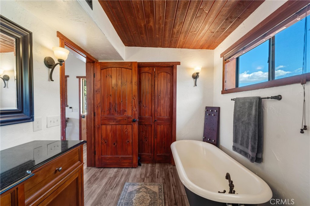 60861 Burnt Valley Road Anza, CA 92539 - Photo 32 of 66 a bathroom with a sink and a mirror