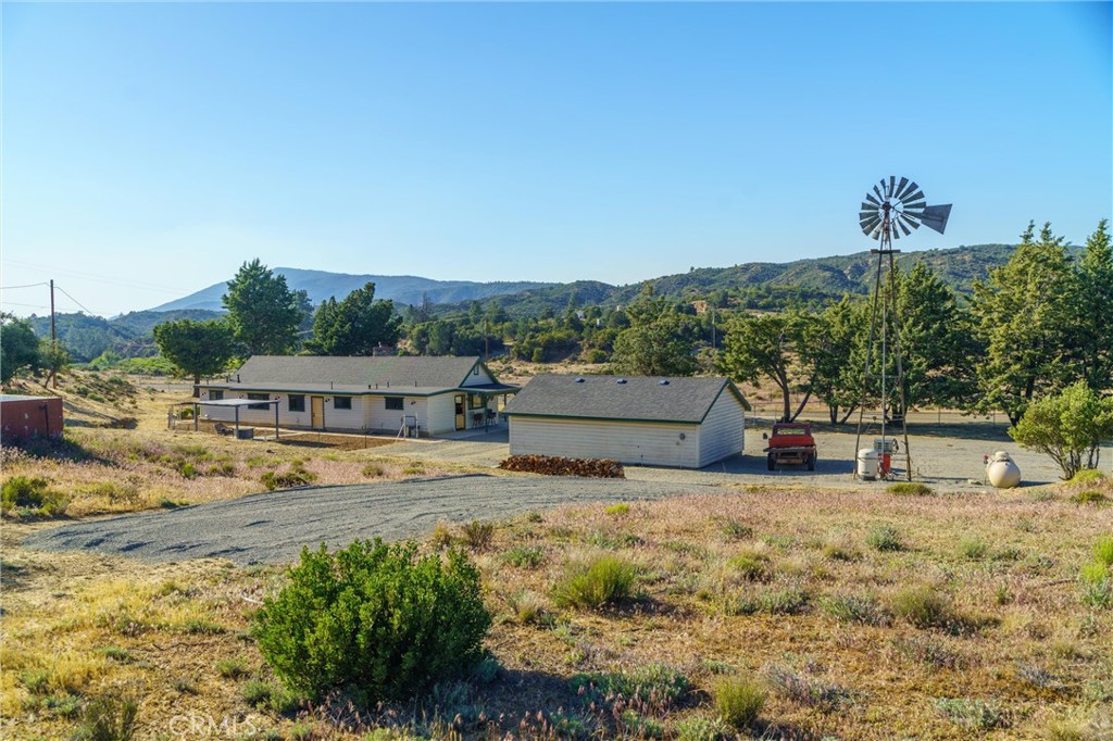 60861 Burnt Valley Road Anza, CA 92539 - Photo 46 of 66 a view of a house with a yard