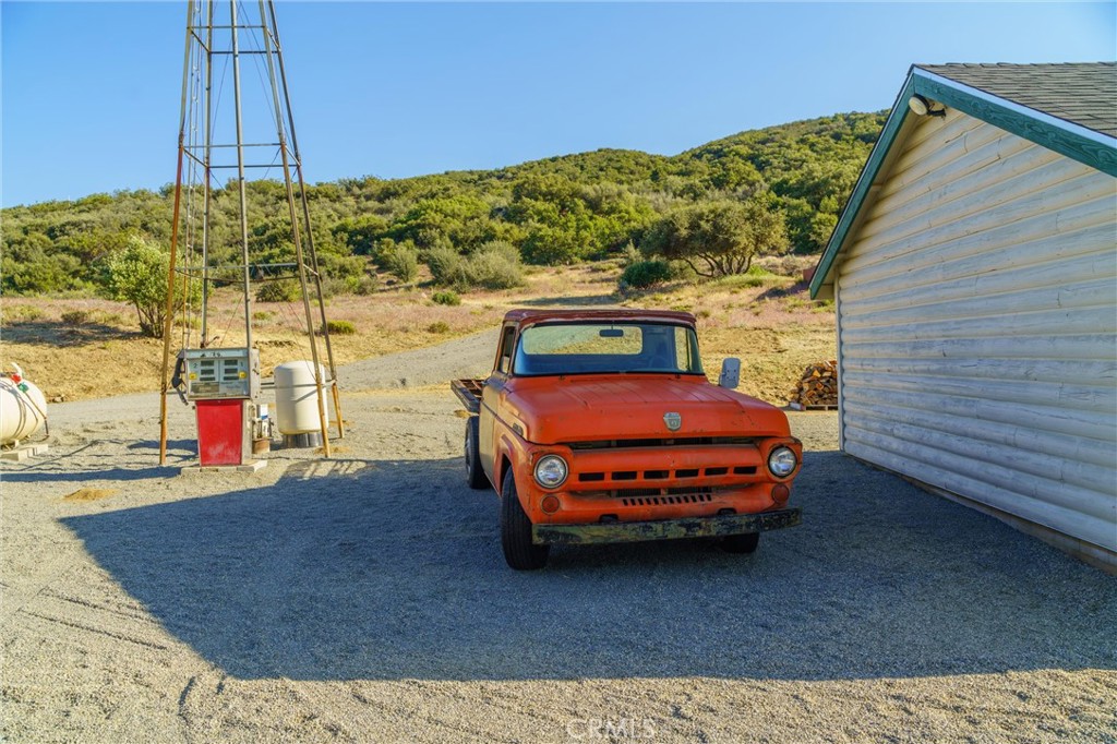 60861 Burnt Valley Road Anza, CA 92539 - Photo 47 of 66 a car parked in front of a house
