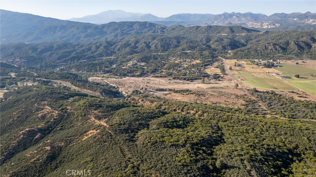 60861 Burnt Valley Road Anza, CA 92539 - Photo 65 of 66 a view of a dry yard with mountains in the background