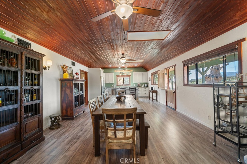 60861 Burnt Valley Road Anza, CA 92539 - Photo 7 of 66 a dining room with furniture and wooden floor