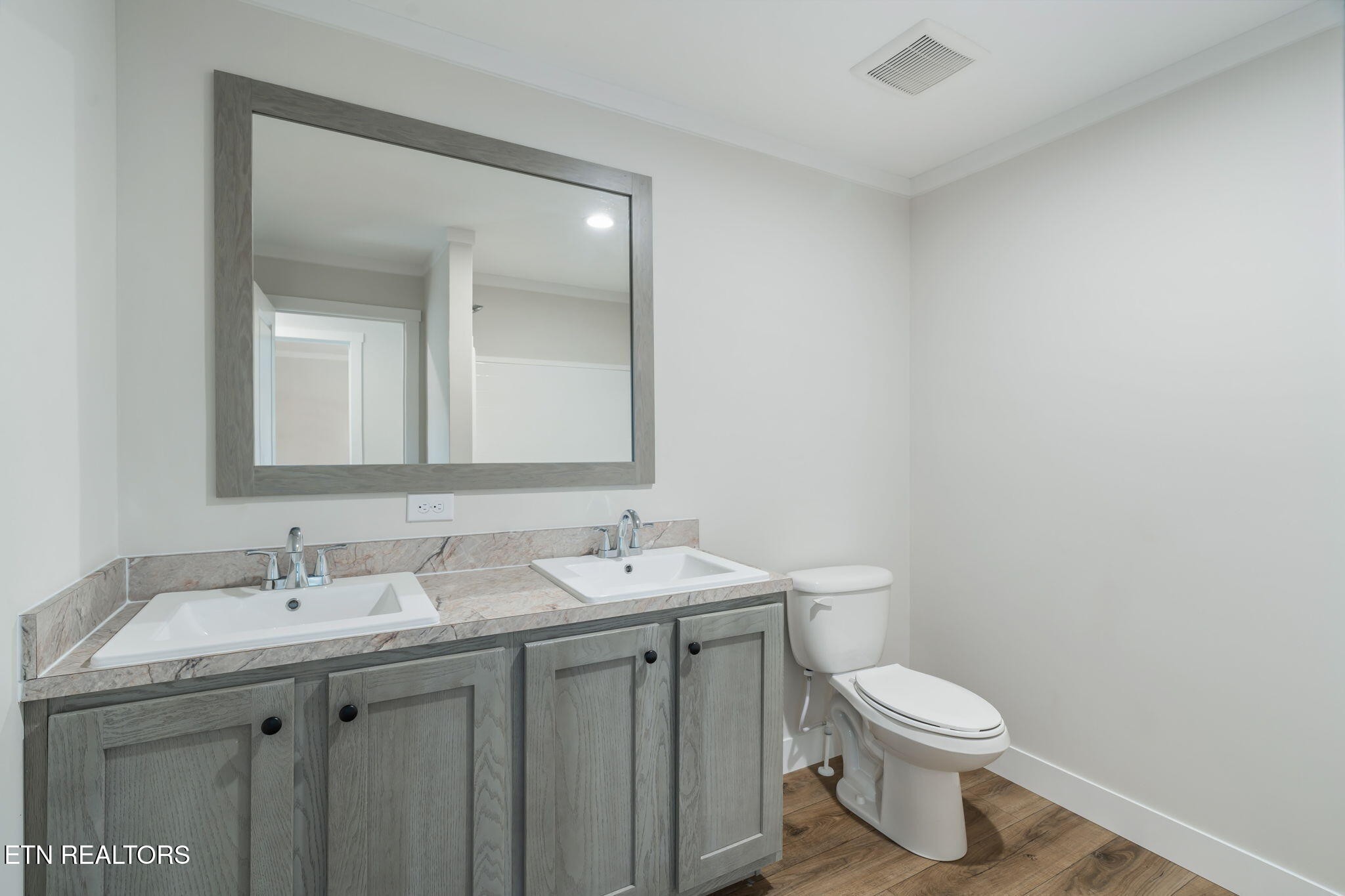 132 Cedarock Lane Rutledge, TN 37861 - Photo 31 of 42 a bathroom with a toilet a sink and mirror