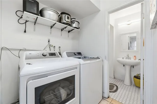a utility room with dryer and washer