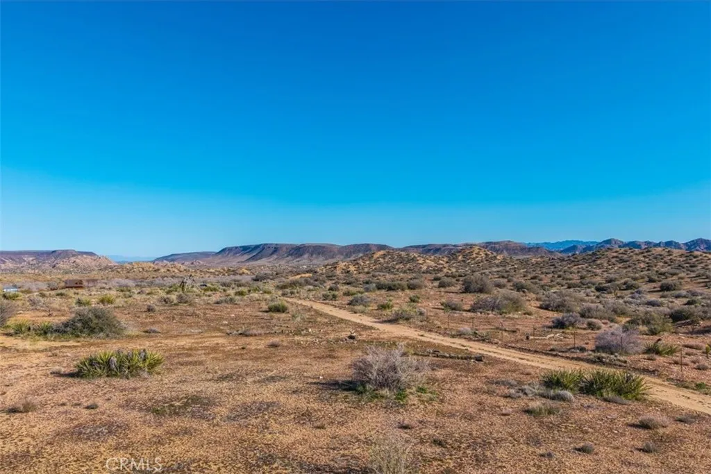 3263 Apache Pioneertown, CA 92268 - Photo 13 of 24 a view of mountain view with sky view