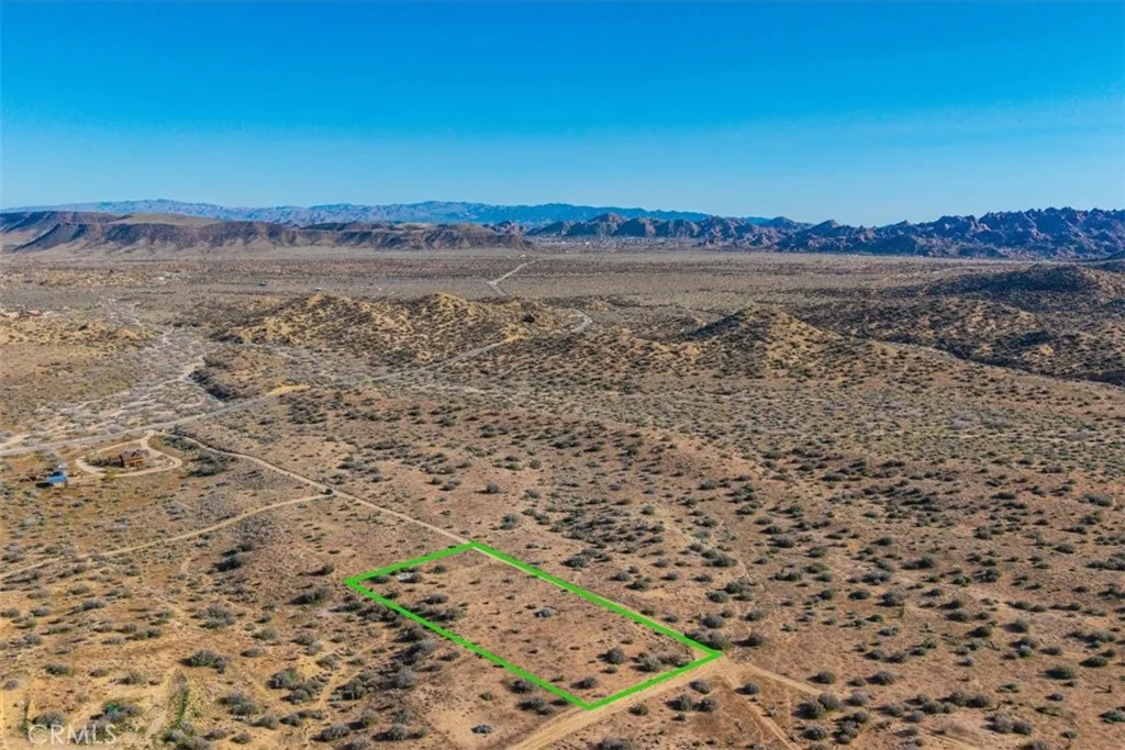 3263 Apache Pioneertown, CA 92268 - Photo 21 of 24 a view of a lake with a mountain