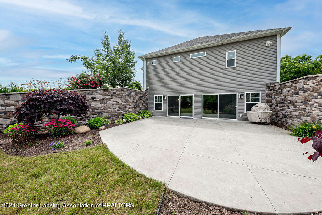 5400 Holt Road Holt, MI 48842 - Photo 13 of 43 Side Patio 1