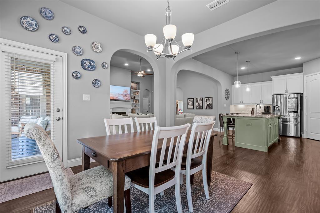 417 Prairie Run Aledo, TX 76008 - Photo 14 of 40 Door to back porch is off the dining area.