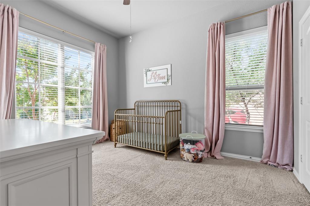 417 Prairie Run Aledo, TX 76008 - Photo 24 of 40 Second bedroom downstairs has ensuite bathroom and beautiful window treatments.