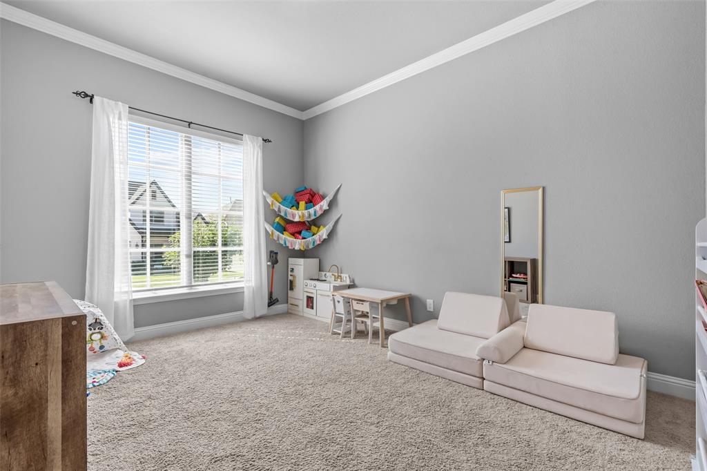 417 Prairie Run Aledo, TX 76008 - Photo 26 of 40 Although this bonus room by entryway does not have a door, it does allow for versatile use.