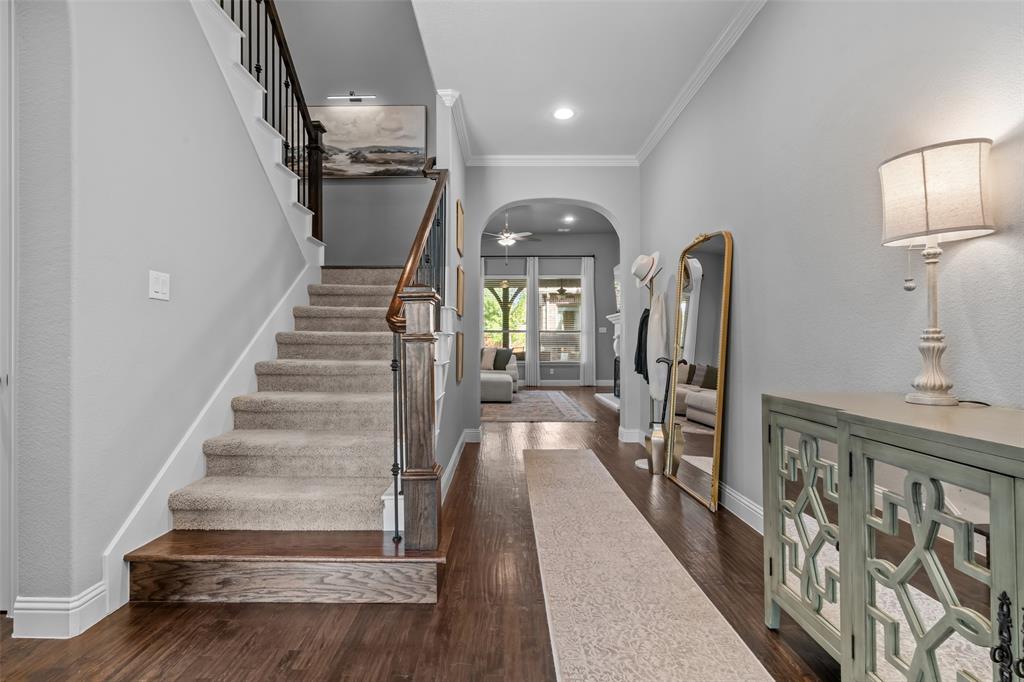 417 Prairie Run Aledo, TX 76008 - Photo 3 of 40 Arches in walkways give a cozy feel throughout the home.