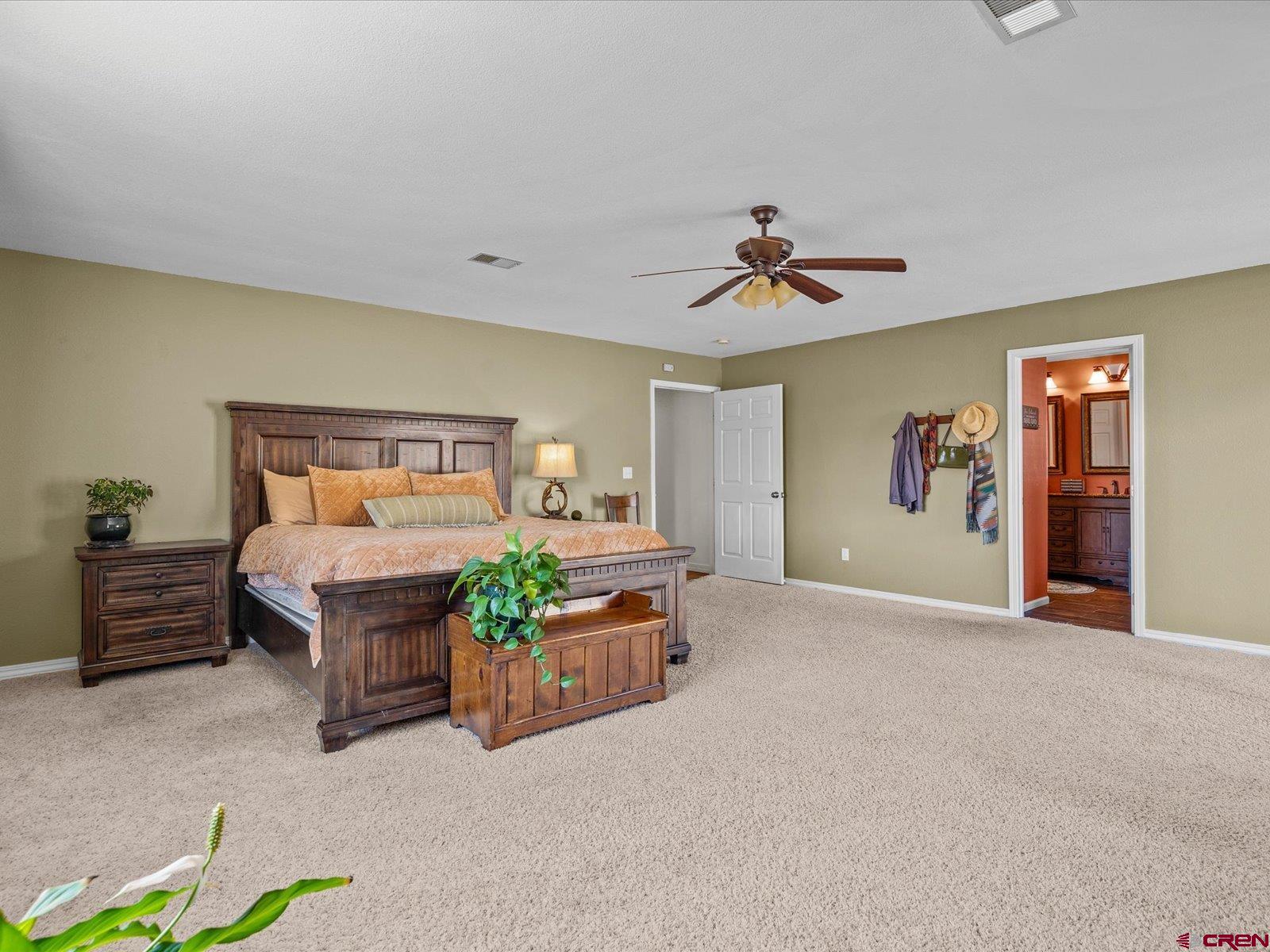 16222 6830th Road Montrose, CO 81401 - Photo 14 of 34 a room with furniture and ceiling fan