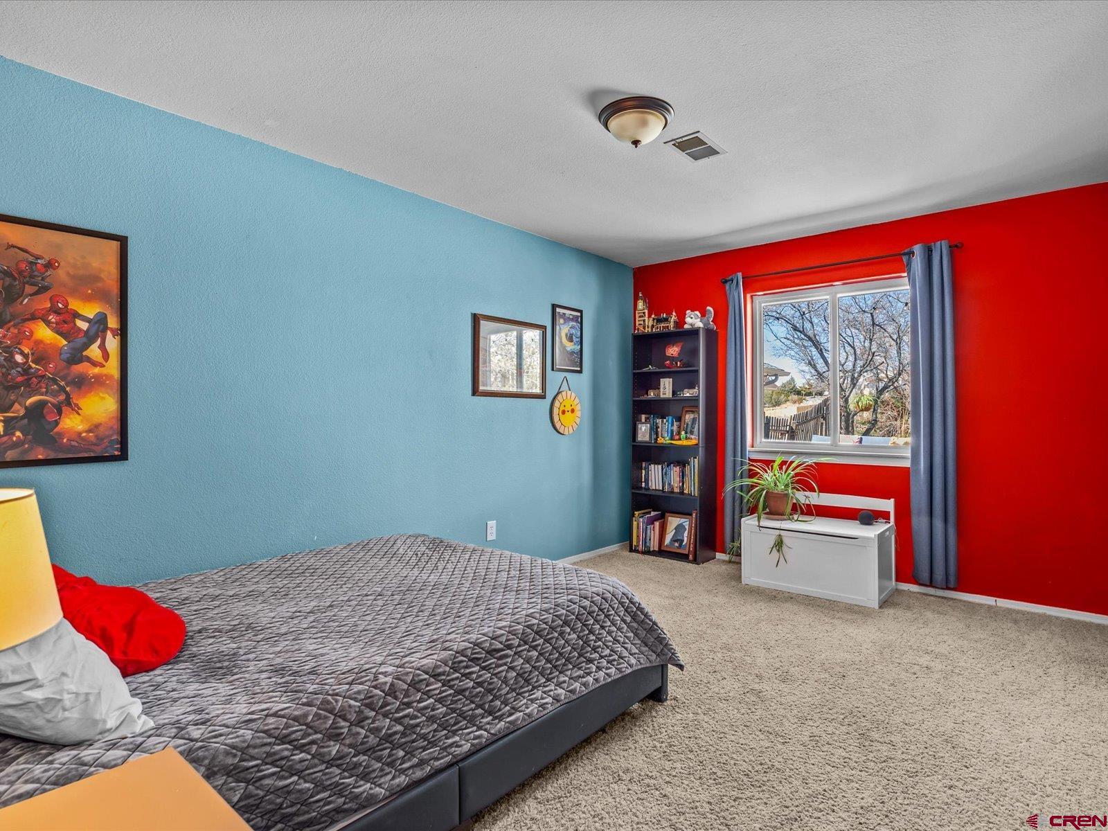 16222 6830th Road Montrose, CO 81401 - Photo 20 of 34 a bedroom with a bed and window