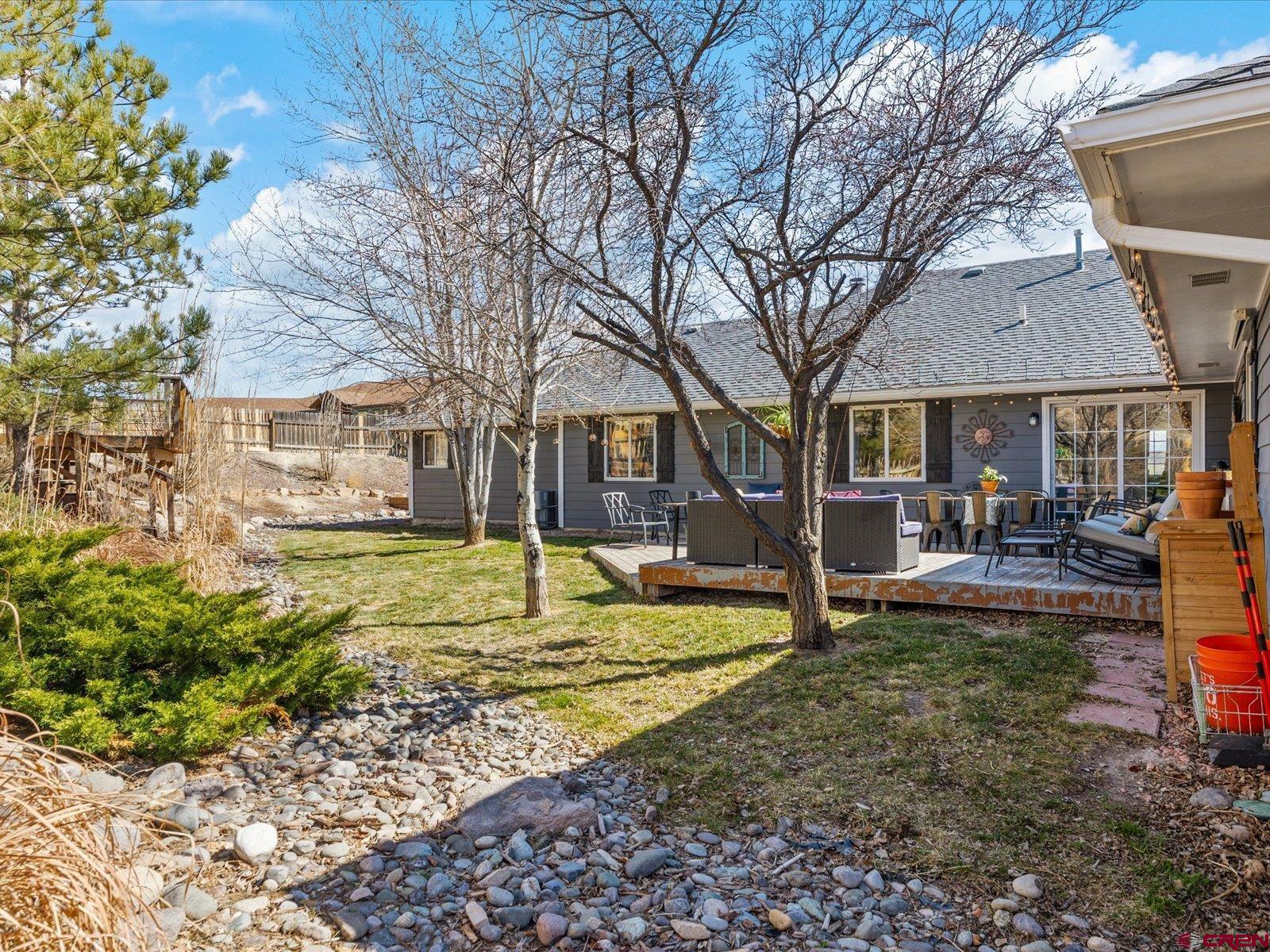 16222 6830th Road Montrose, CO 81401 - Photo 27 of 34 a view of a house with a yard