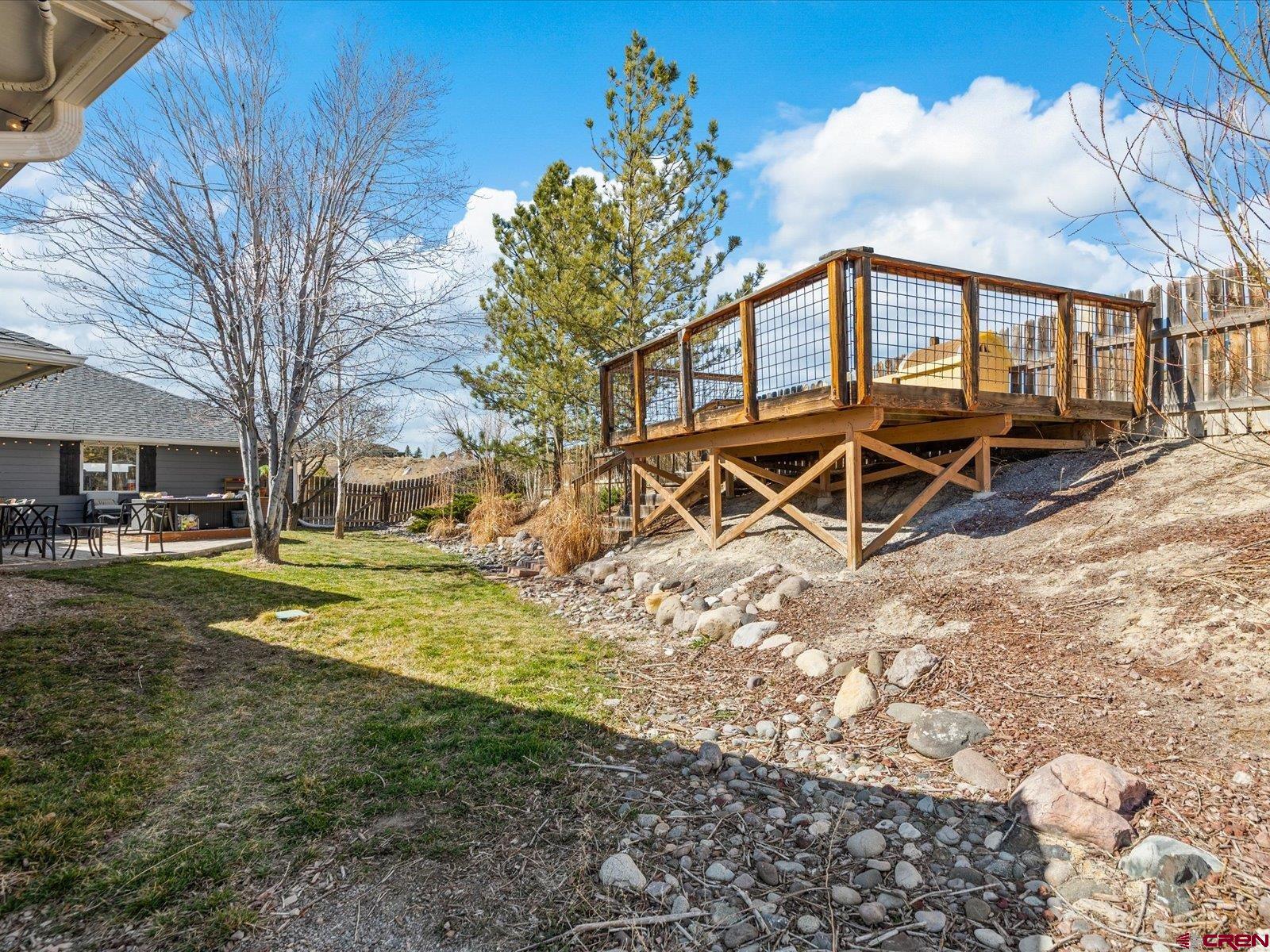 16222 6830th Road Montrose, CO 81401 - Photo 28 of 34 a view of a house with backyard and sitting area