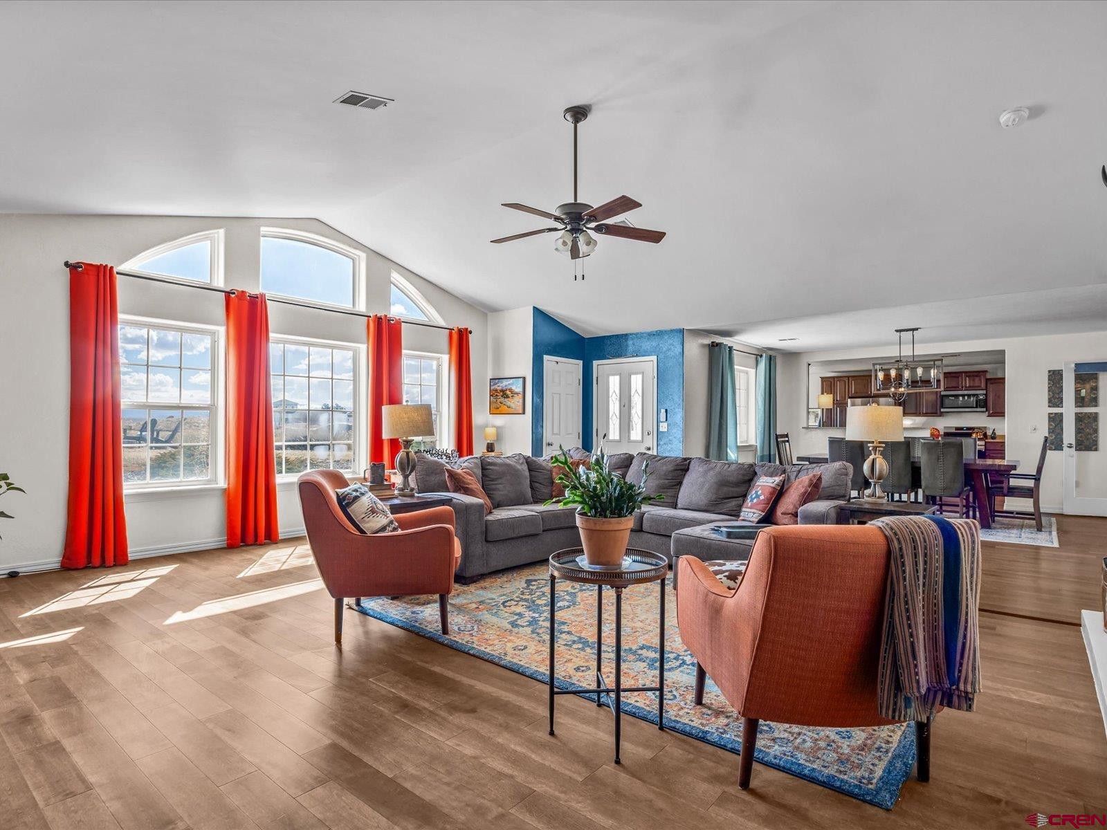 16222 6830th Road Montrose, CO 81401 - Photo 3 of 34 a living room with furniture and a large window