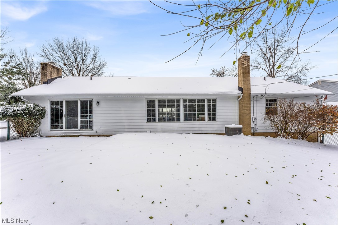 5025 Clubside Road Lyndhurst, OH 44124 - Photo 35 of 35 Snow covered property featuring central AC unit