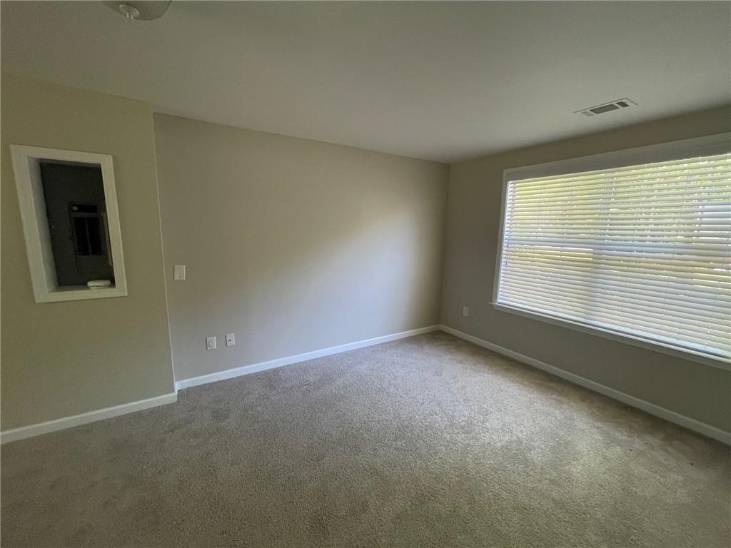 95 Luke Drive Dallas, GA 30132 - Photo 15 of 15 an empty room with a window