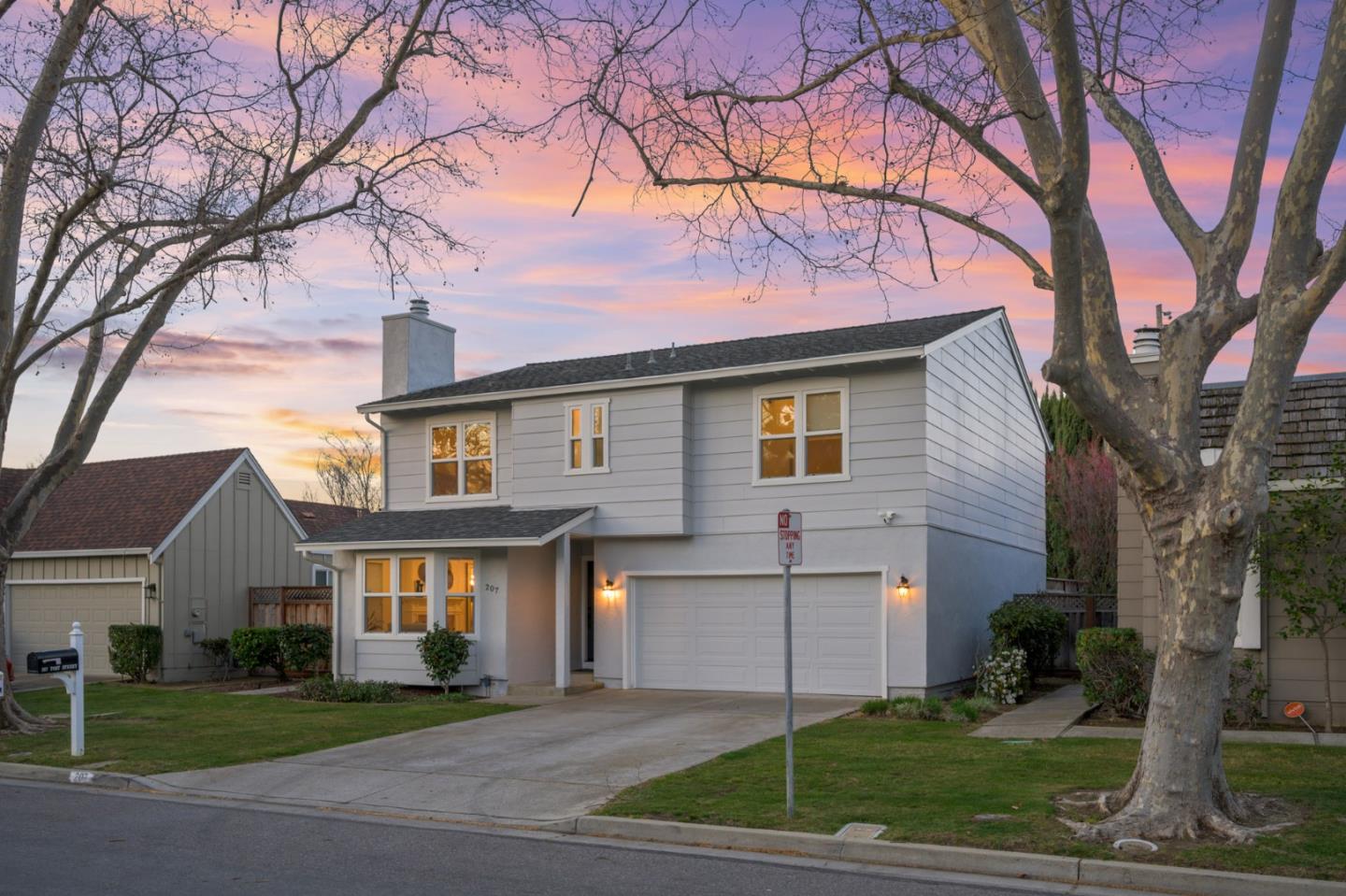 207 Post Street Mountain View, CA 94040 - Photo 2 of 60 a front view of a house with a garden