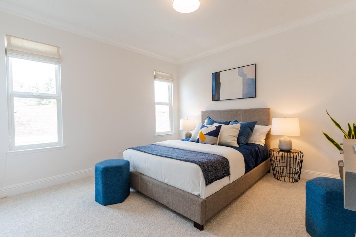 207 Post Street Mountain View, CA 94040 - Photo 35 of 60 a spacious bedroom with a bed and a window