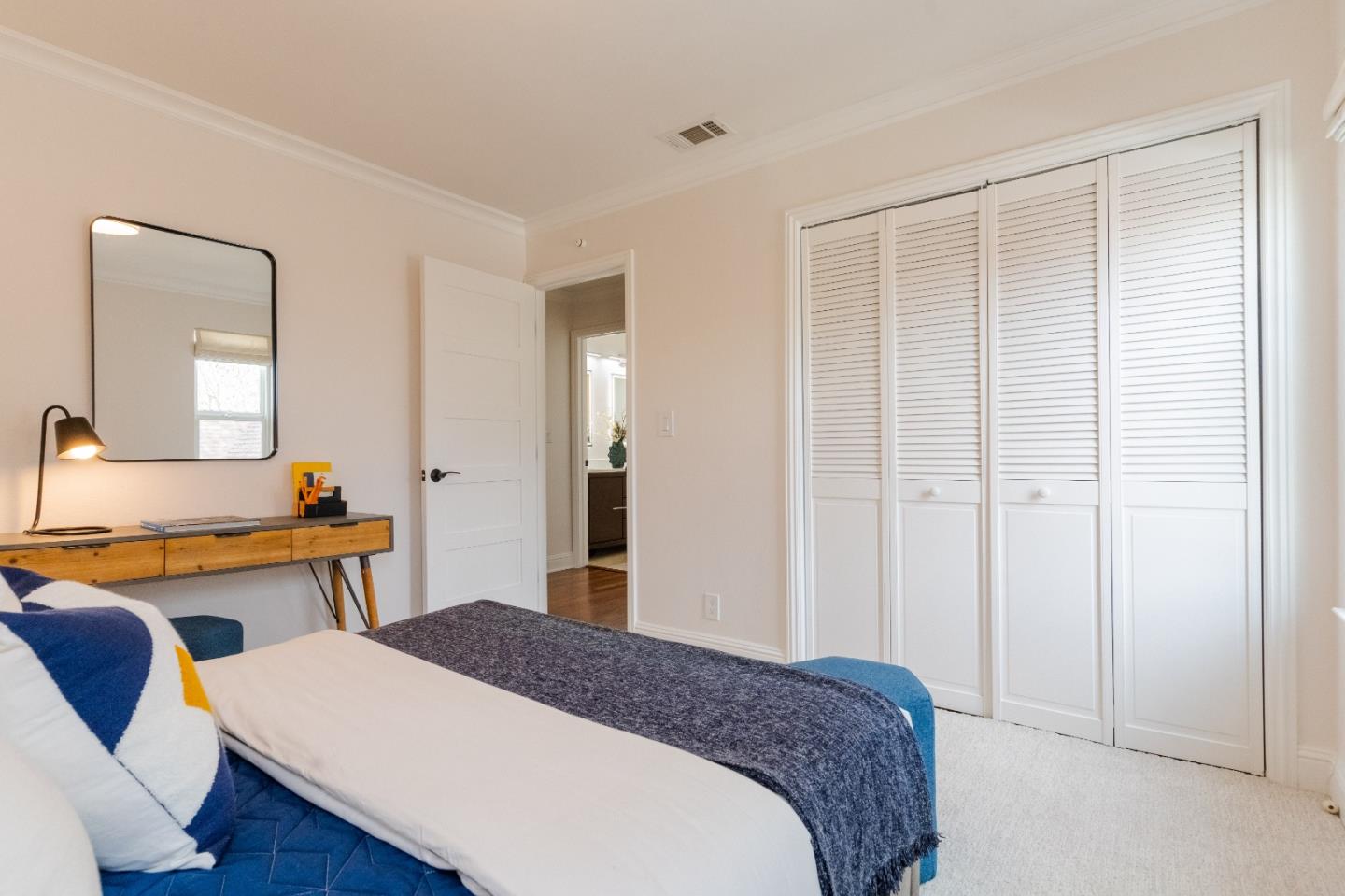 207 Post Street Mountain View, CA 94040 - Photo 37 of 60 a bedroom with a bed and a table in it