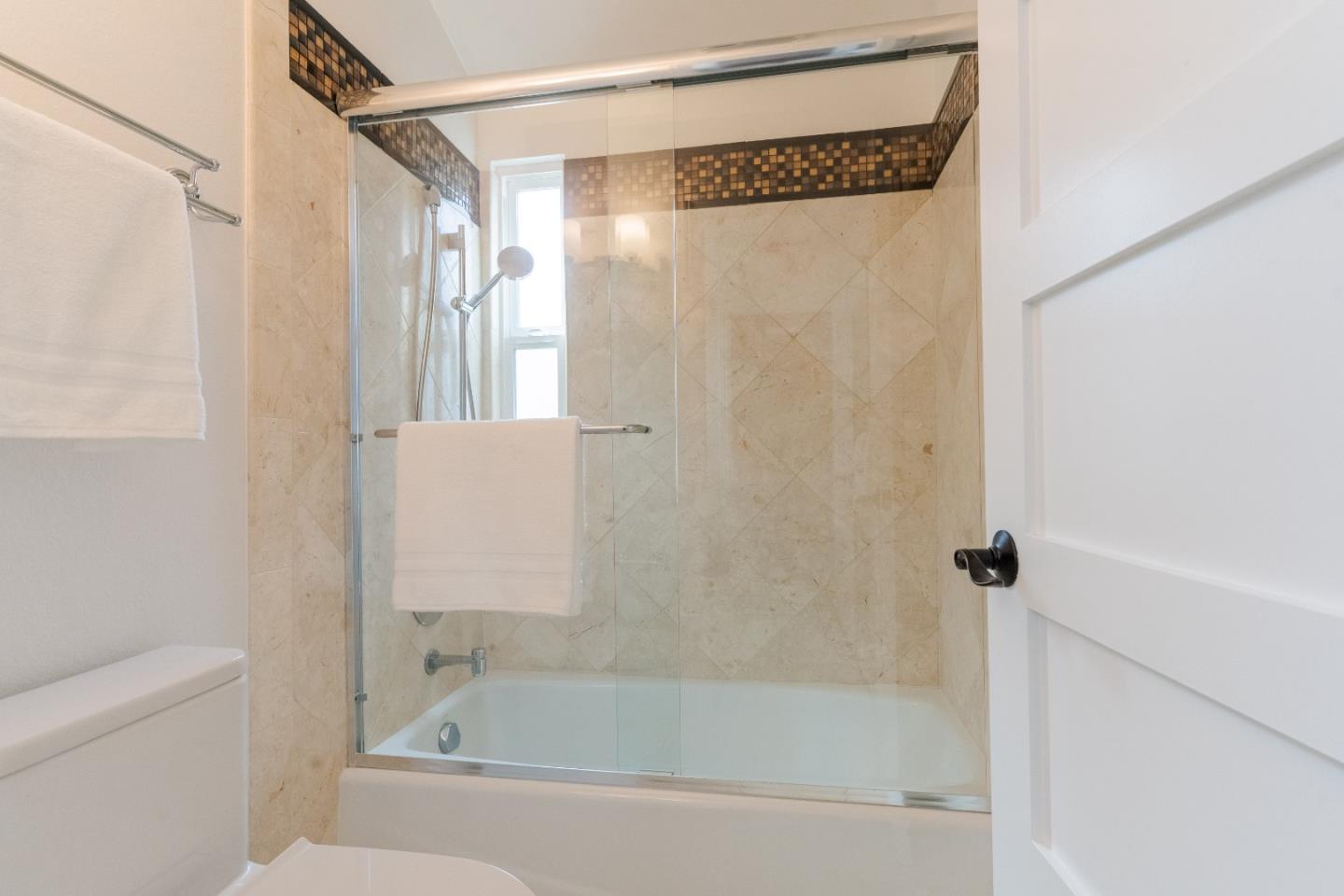 207 Post Street Mountain View, CA 94040 - Photo 40 of 60 a bathroom with a bathtub and a shower