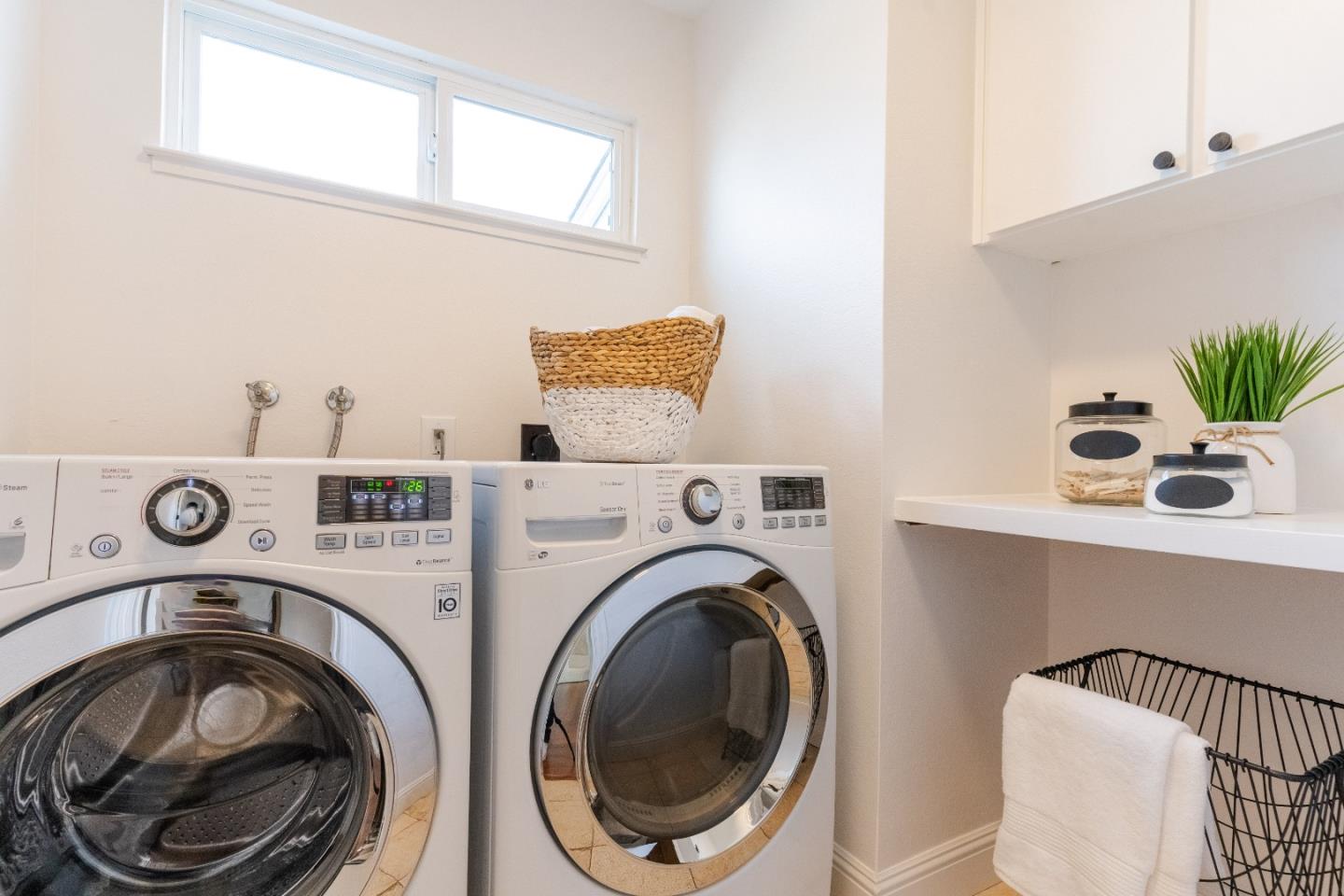 207 Post Street Mountain View, CA 94040 - Photo 42 of 60 a utility room with dryer and washer