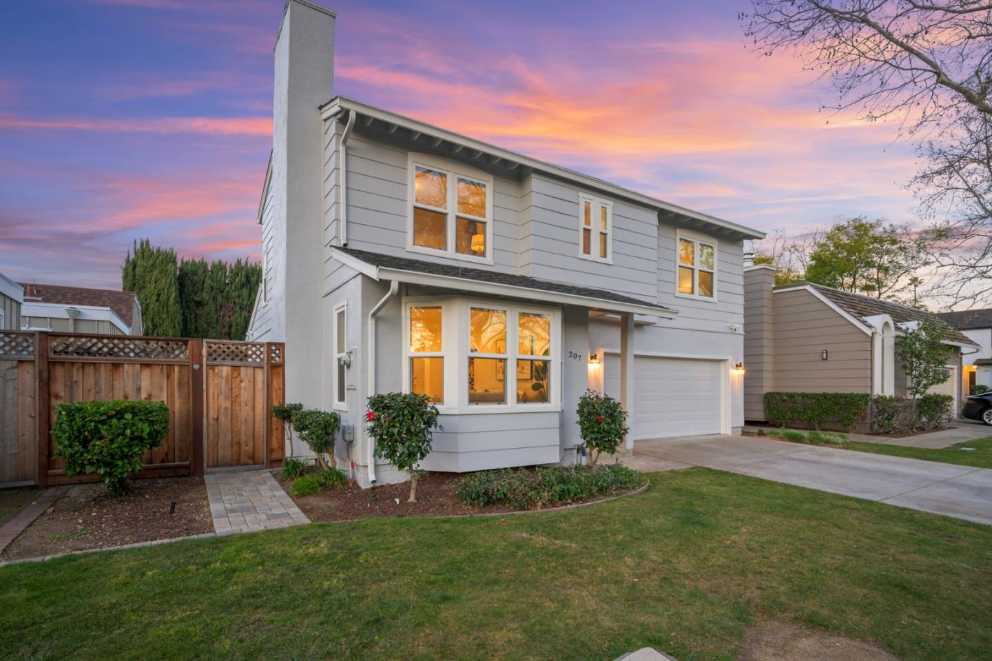 207 Post Street Mountain View, CA 94040 - Photo 59 of 60 a front view of a house with a yard and garage