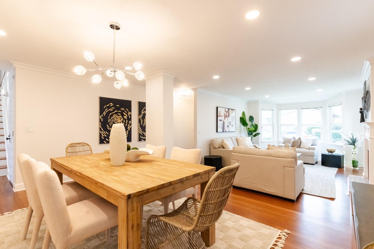 207 Post Street Mountain View, CA 94040 - Photo 8 of 60 a view of a dining room with furniture wooden floor and chandelier