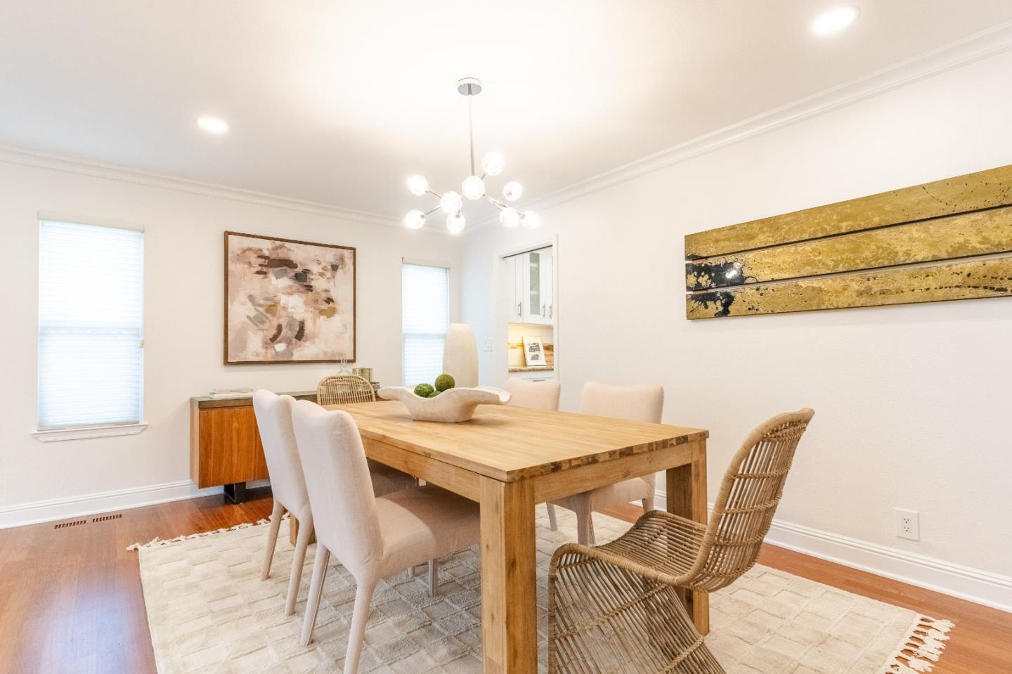 207 Post Street Mountain View, CA 94040 - Photo 9 of 60 a view of a dining room with furniture and wooden floor