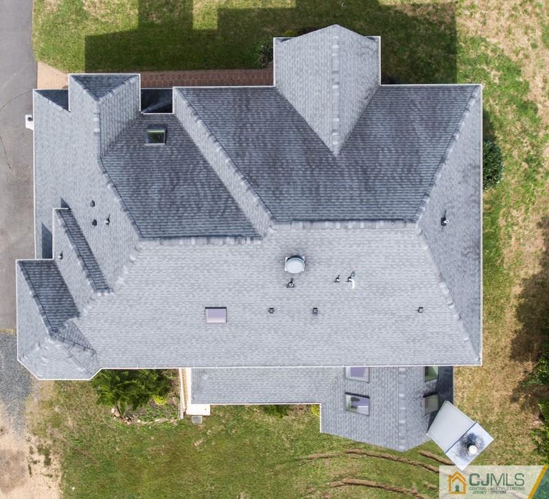 238 Fresh Ponds Road Monroe Township, NJ 08831 - Photo 15 of 17 an aerial view of residential houses with outdoor space