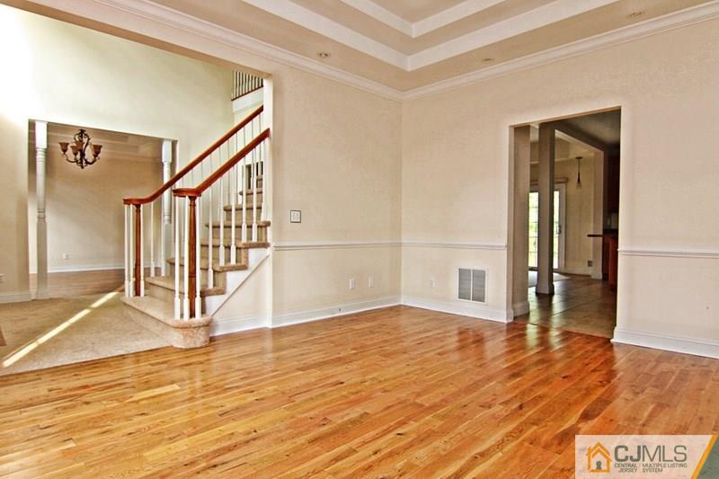 238 Fresh Ponds Road Monroe Township, NJ 08831 - Photo 5 of 17 a view of an entryway with wooden floor