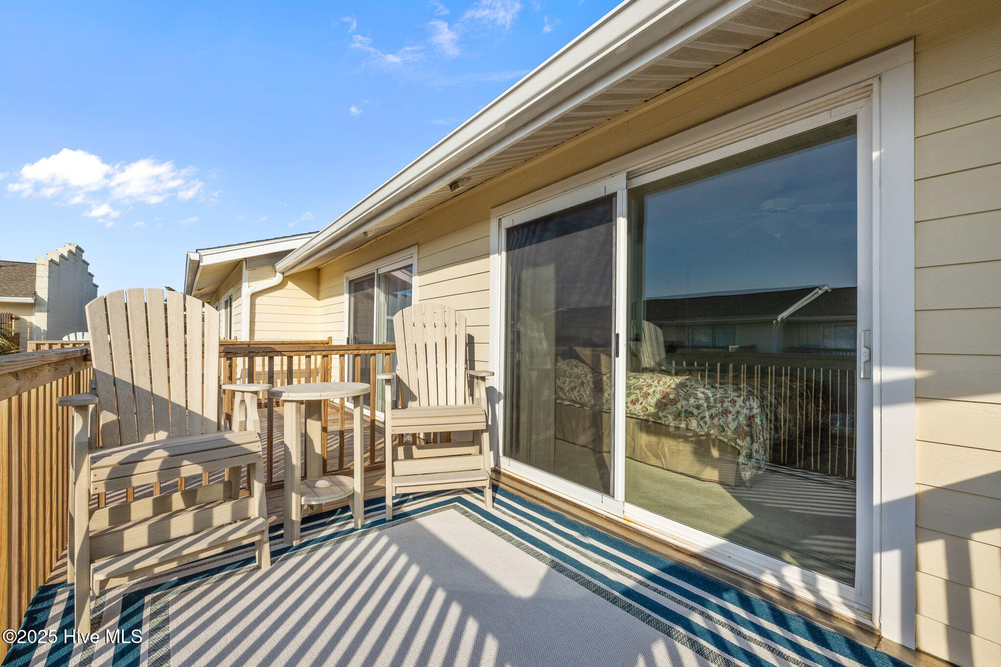 283 Salter Path Road, Unit 109 Pine Knoll Shores, NC 28512 - Photo 17 of 36 Balcony Off Primary Bedroom