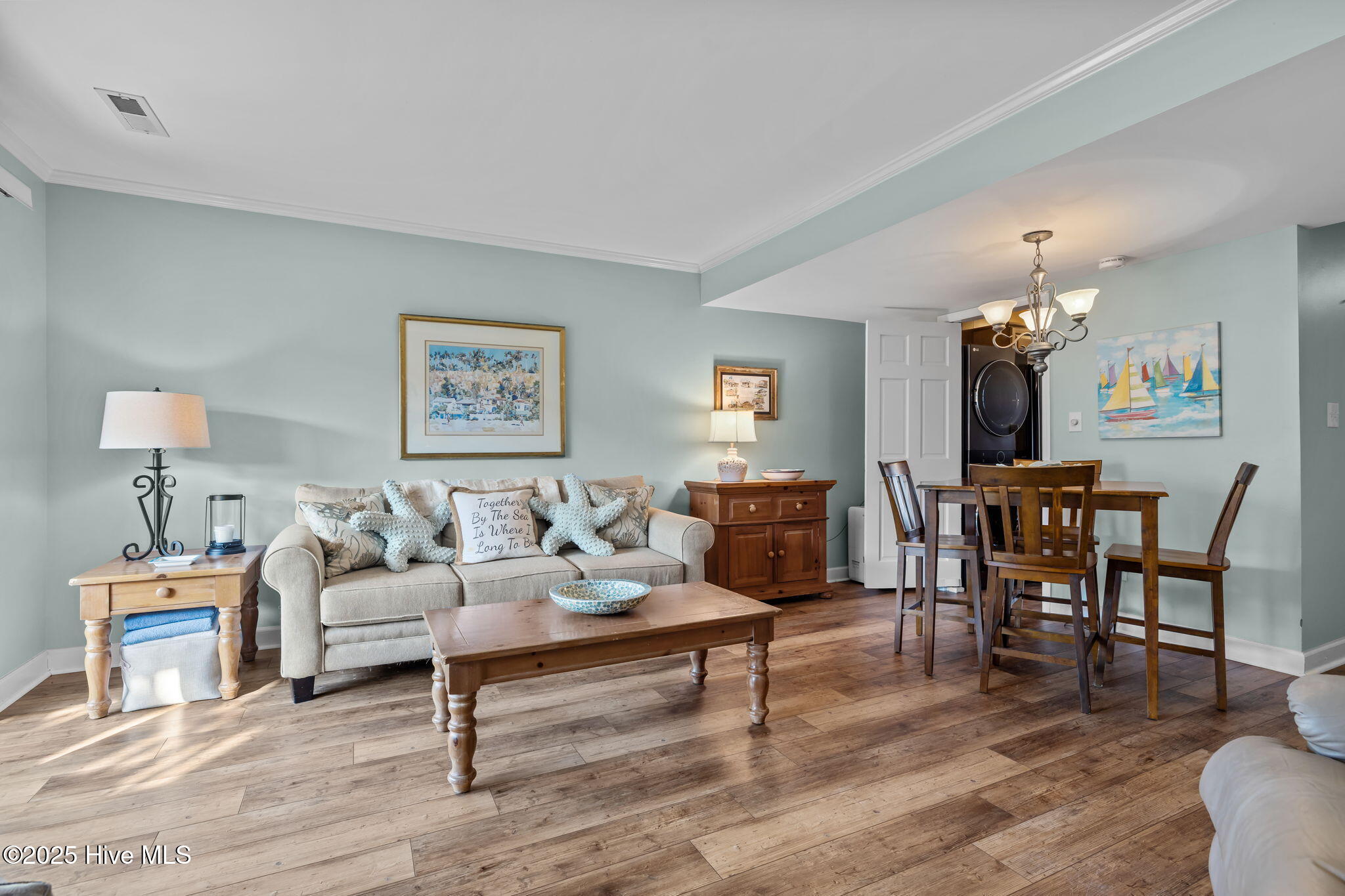 283 Salter Path Road, Unit 109 Pine Knoll Shores, NC 28512 - Photo 2 of 36 Living & Dining Area