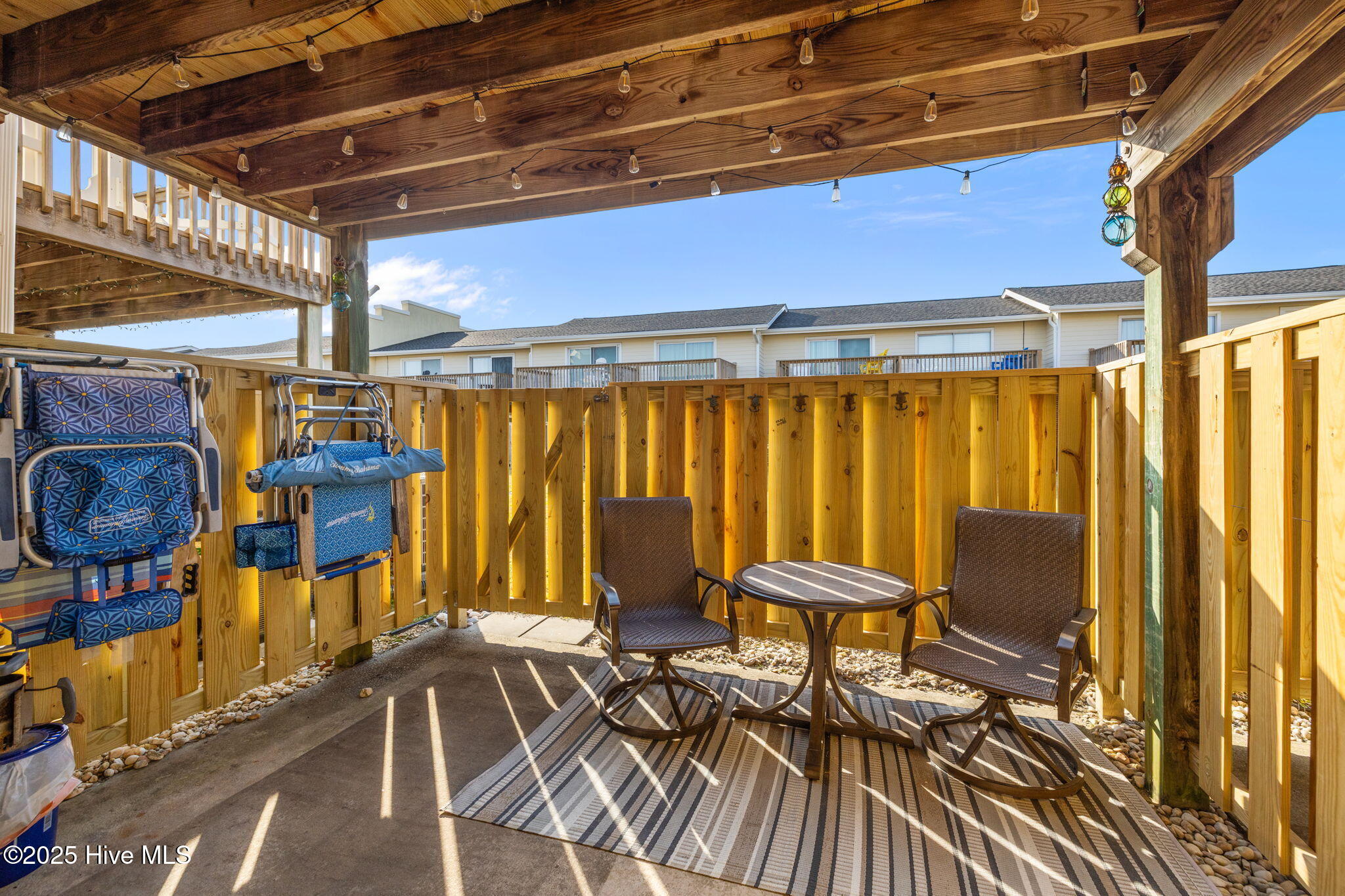 283 Salter Path Road, Unit 109 Pine Knoll Shores, NC 28512 - Photo 22 of 36 Fenced Patio