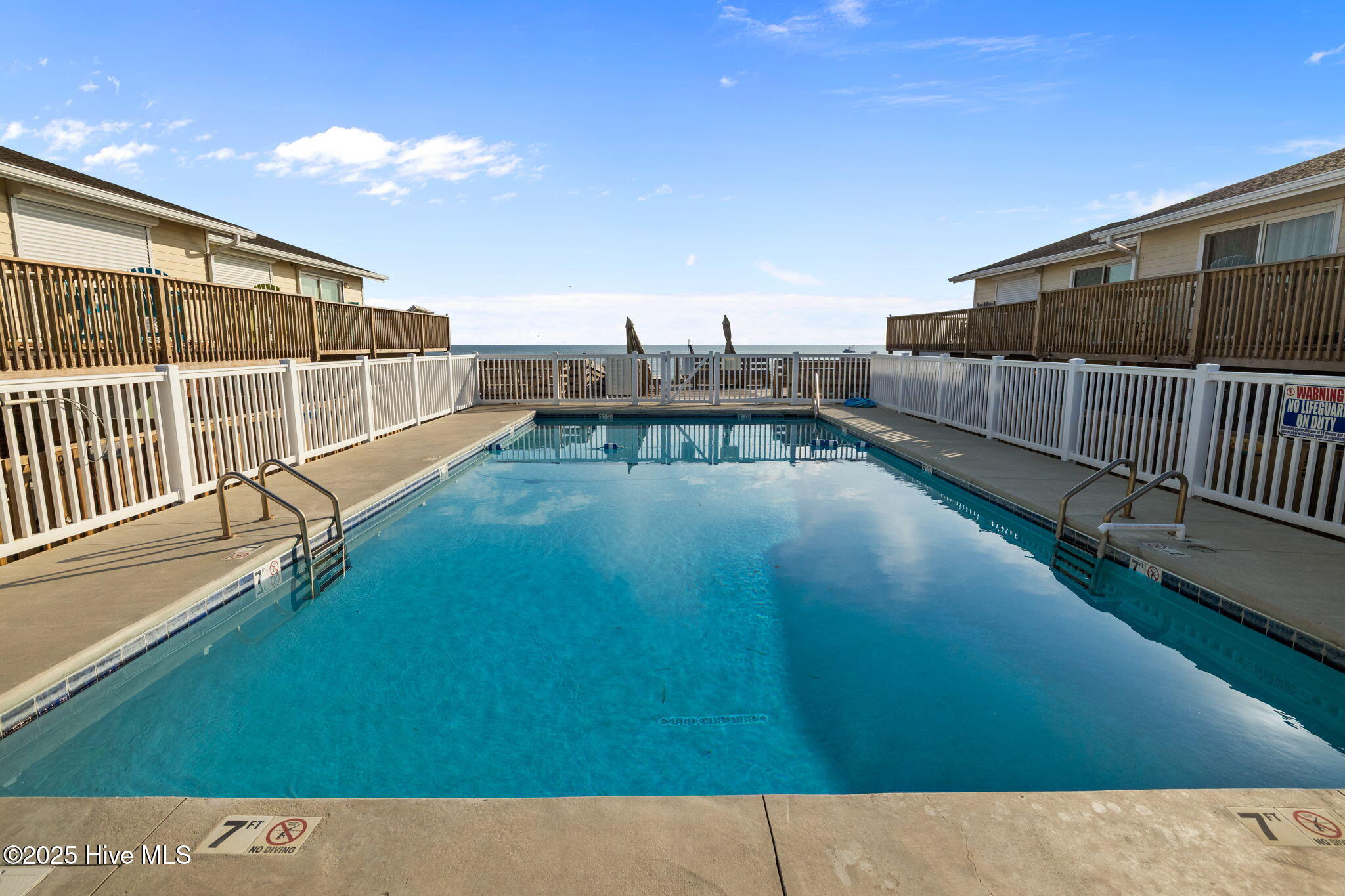 283 Salter Path Road, Unit 109 Pine Knoll Shores, NC 28512 - Photo 24 of 36 Community Pool