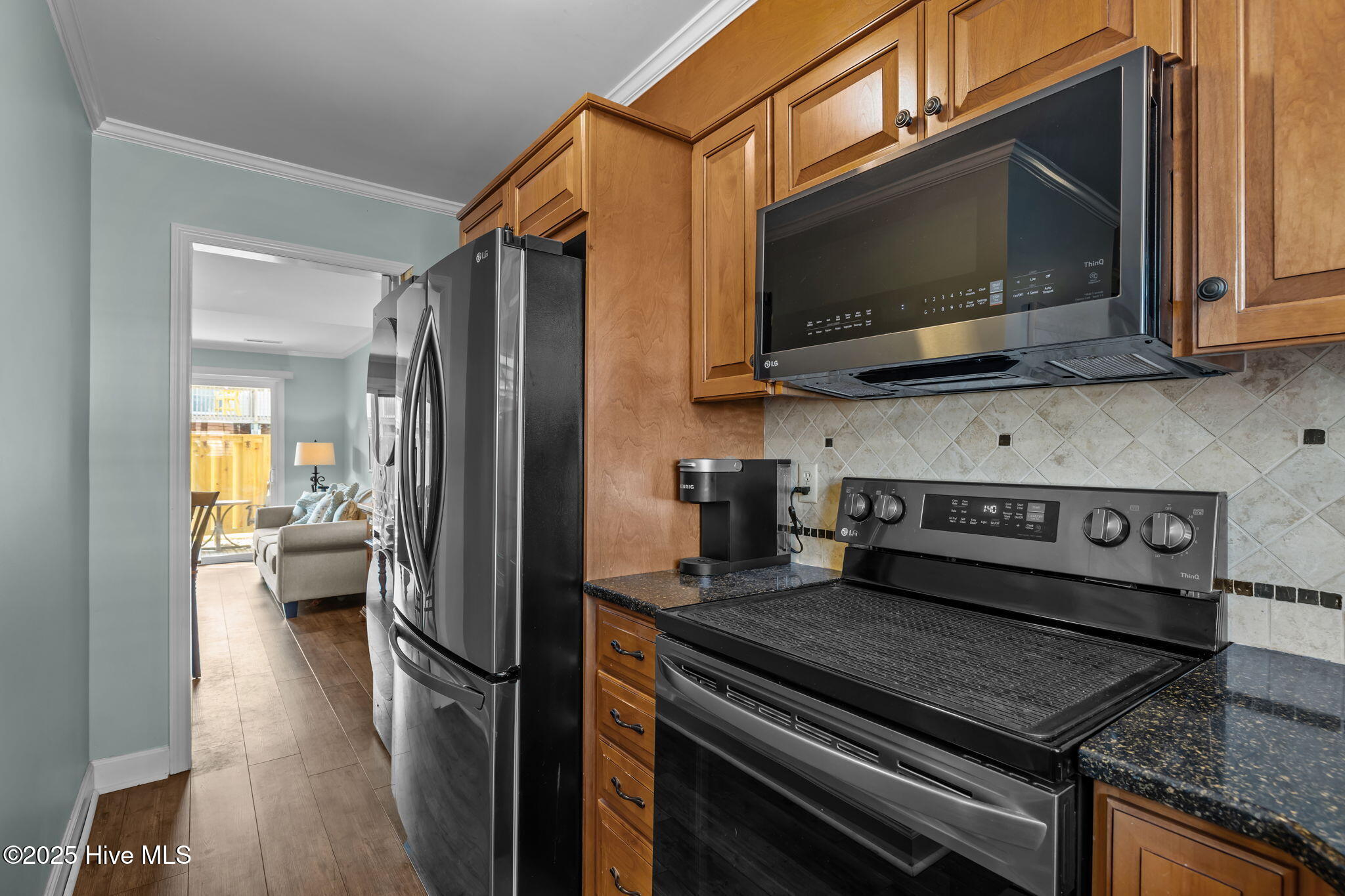 283 Salter Path Road, Unit 109 Pine Knoll Shores, NC 28512 - Photo 9 of 36 Kitchen Into Living Area