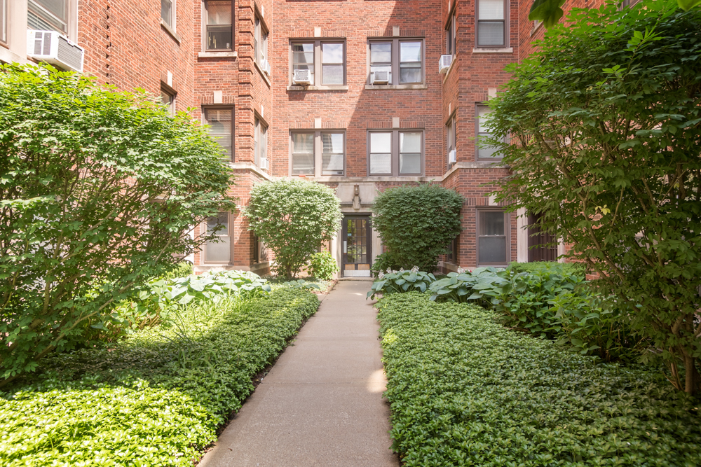 54 Forest Avenue, Unit 3W Riverside, IL 60546 - Photo 2 of 6 a view of a building with garden