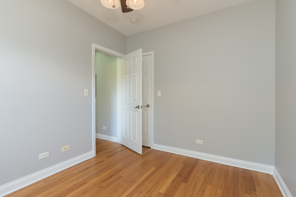 54 Forest Avenue, Unit 3W Riverside, IL 60546 - Photo 5 of 6 a view of an empty room with wooden floor