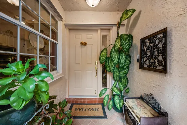 a vase of flowers sitting on a table