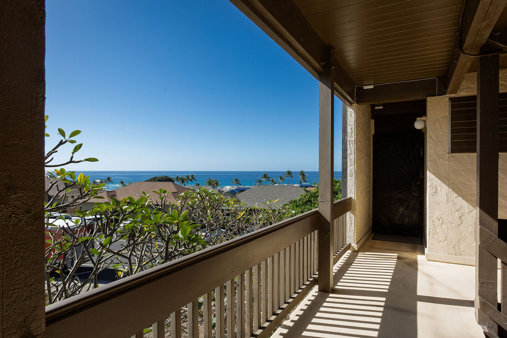 75-5873 Walua Road, Unit 212 Kailua-Kona, HI 96740 - Photo 14 of 17 a view of balcony with wooden floor
