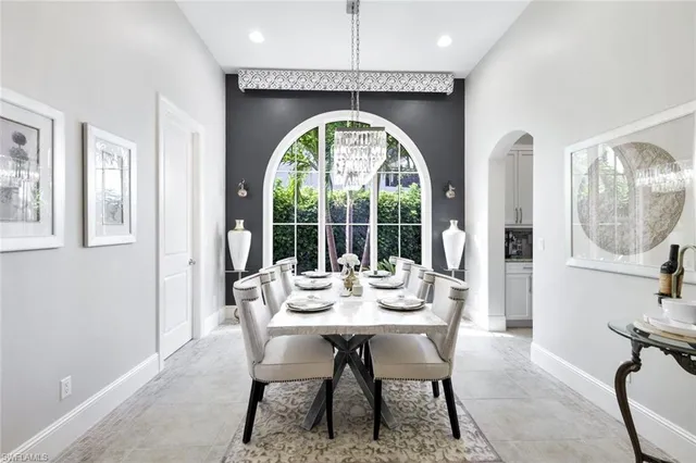 a dining room with furniture a livingroom and outdoor view