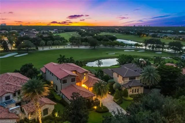 an aerial view of a house with a garden