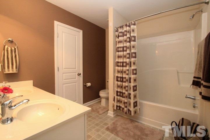 2520 Asher View Court Raleigh, NC 27606 - Photo 20 of 24 Secondary bathroom with double bowl vanity for the two large upstairs bedrooms.