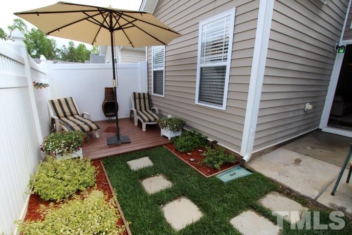 2520 Asher View Court Raleigh, NC 27606 - Photo 23 of 24 Private area has been enhanced by a floating deck for comfort.