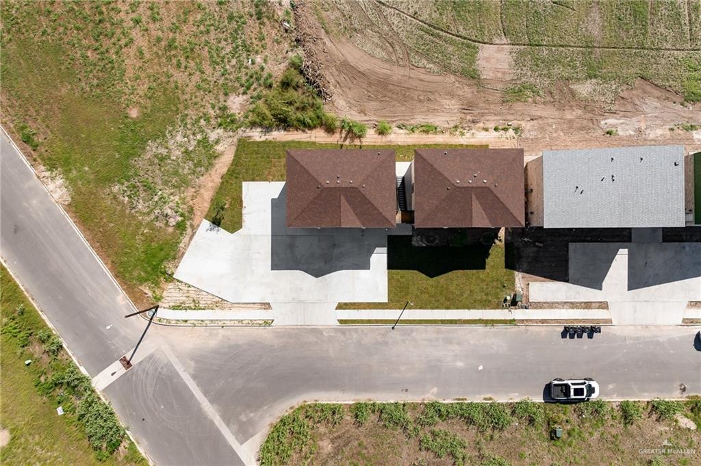 2602 Clearview Street Weslaco, TX 78596 - Photo 13 of 15 an aerial view of a house with a yard