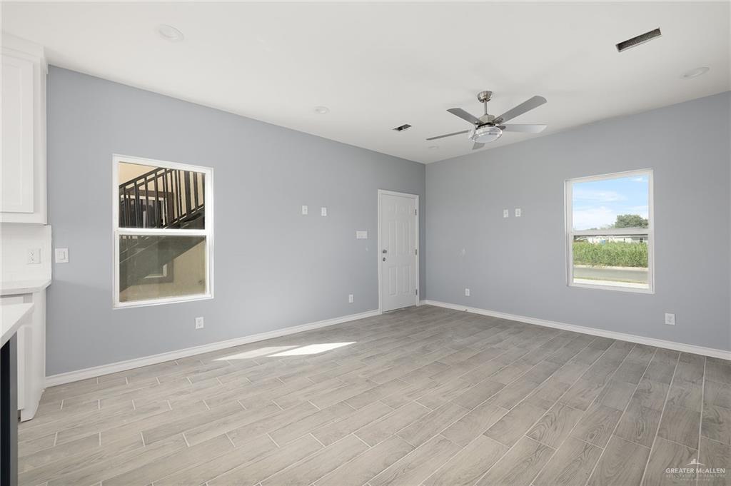 2602 Clearview Street Weslaco, TX 78596 - Photo 3 of 15 a view of an empty room with a window
