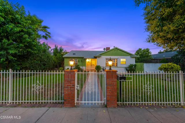 a view of a house with a street view