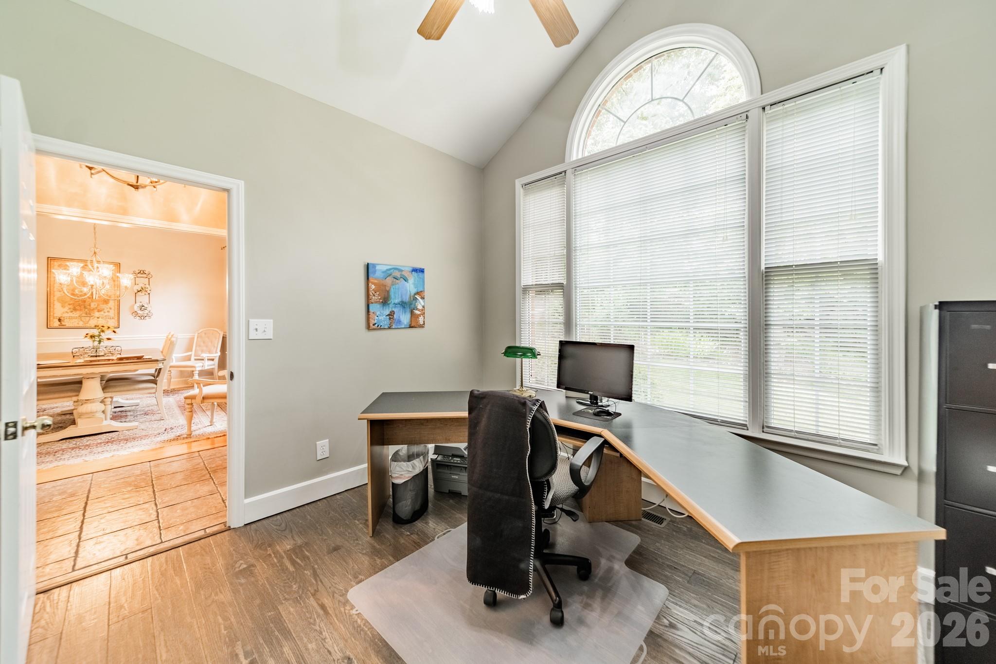 7545 Rabbit Circle Denver, NC 28037 - Photo 9 of 37 a view of a workspace with furniture and a window