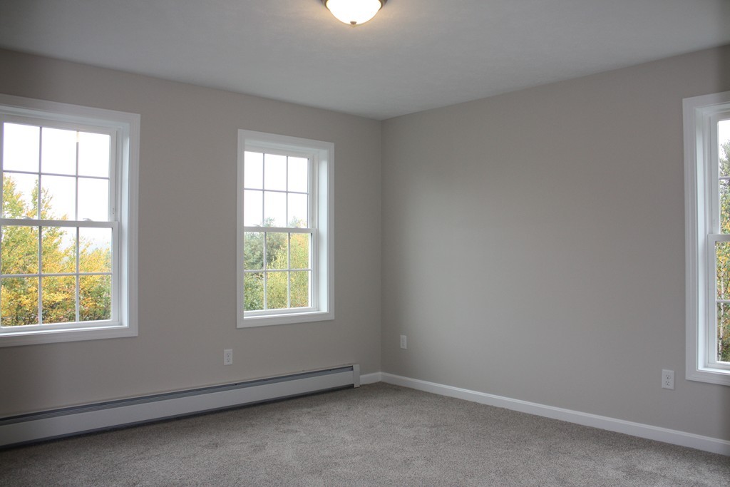 1080 West Road Ashby, MA 01431 - Photo 8 of 10 an empty room with a window